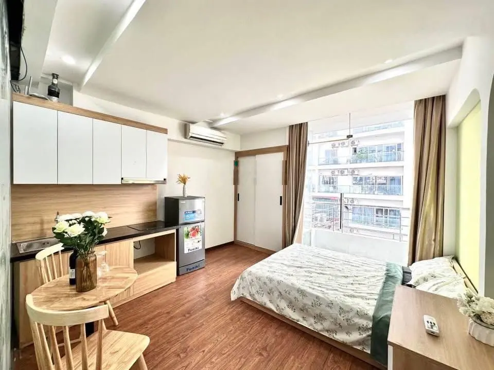 Bán tòa Apartment gần trường Chu Văn An_DT76m2x8T_14phòng_oto qua nhà_mặt ngõ thông_Giá 16.5 Tỷ