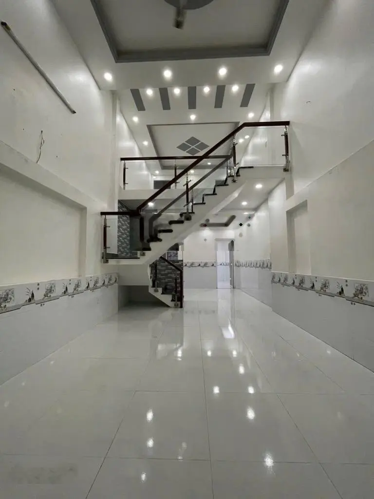 65m2(gần 100m2 sàn), Trần Thị Cờ, 1 trệt 1 lửng, đường nhựa 6m thông